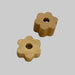 Two brown flower-shaped objects with a central hole on a light gray background