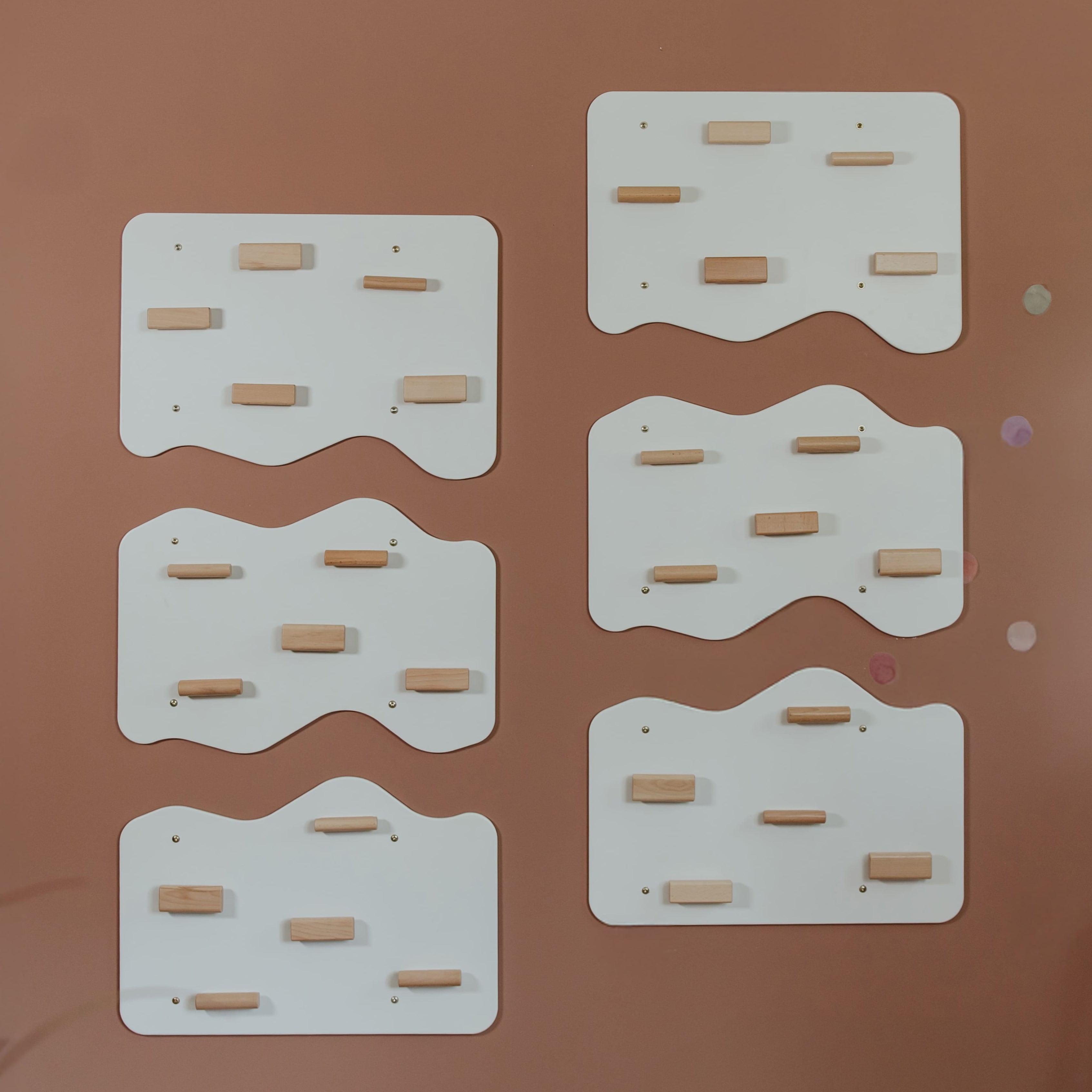 Indoor Rock Wall with Cloud-Shaped Panels & Wooden Climbing Holds