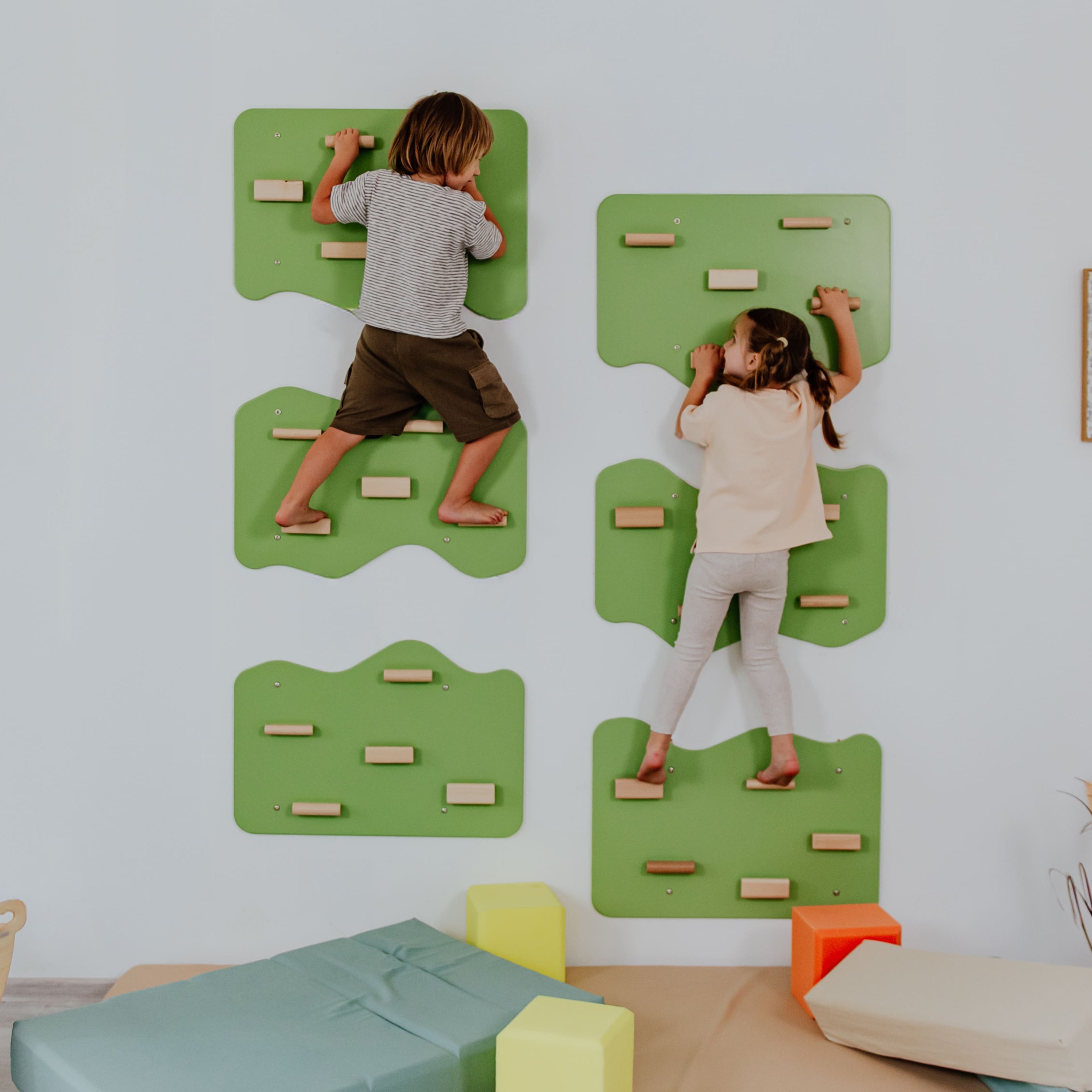 Indoor Rock Wall with Cloud-Shaped Panels & Wooden Climbing Holds