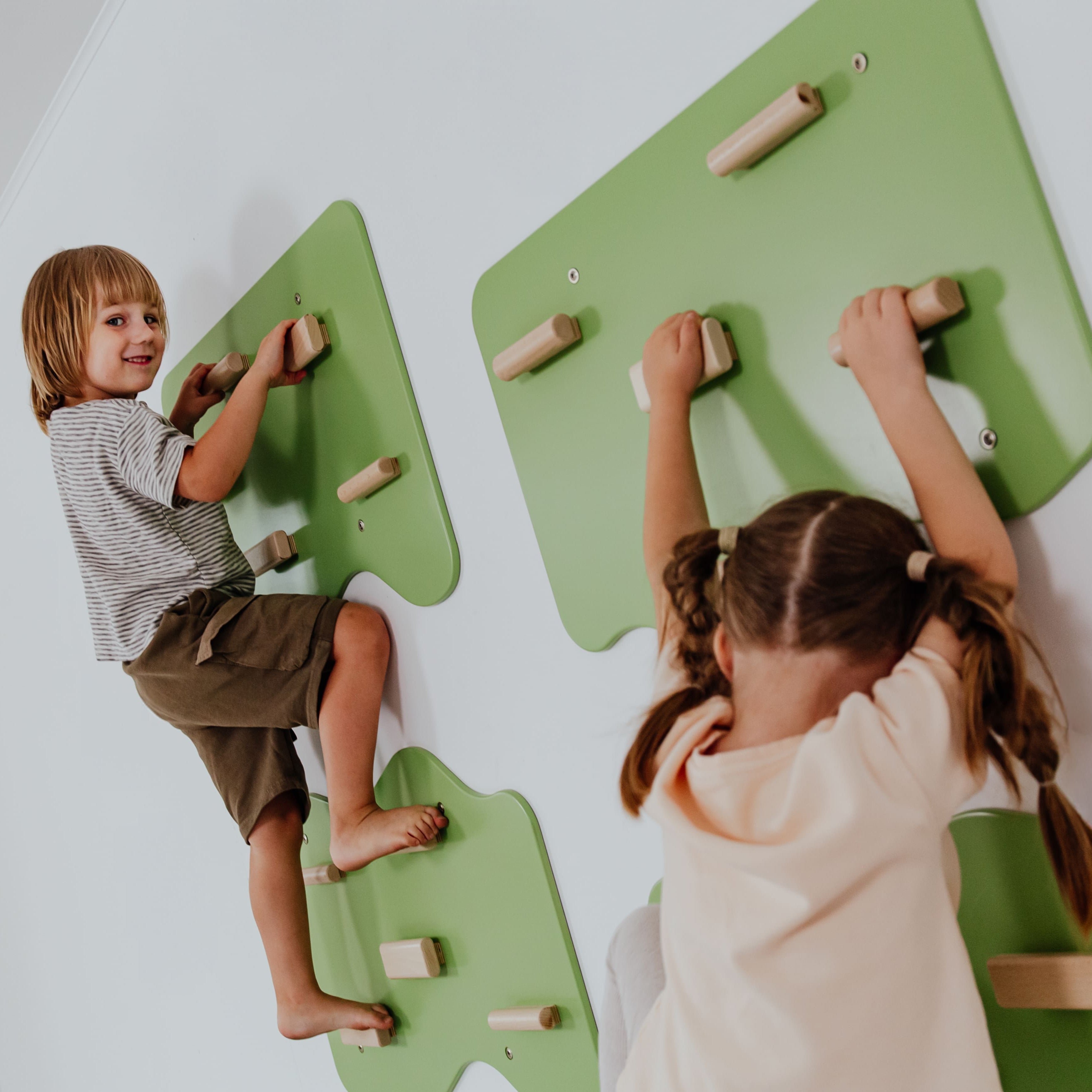 Indoor Rock Wall with Cloud-Shaped Panels & Wooden Climbing Holds