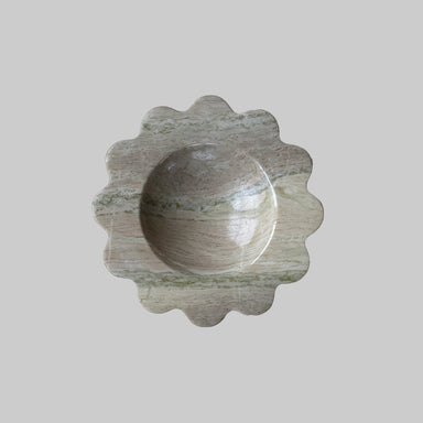Decorative stone bowl on a light gray background